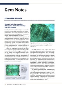 Emerald with bertrandite-phlogopite veins resembling fracture fillings